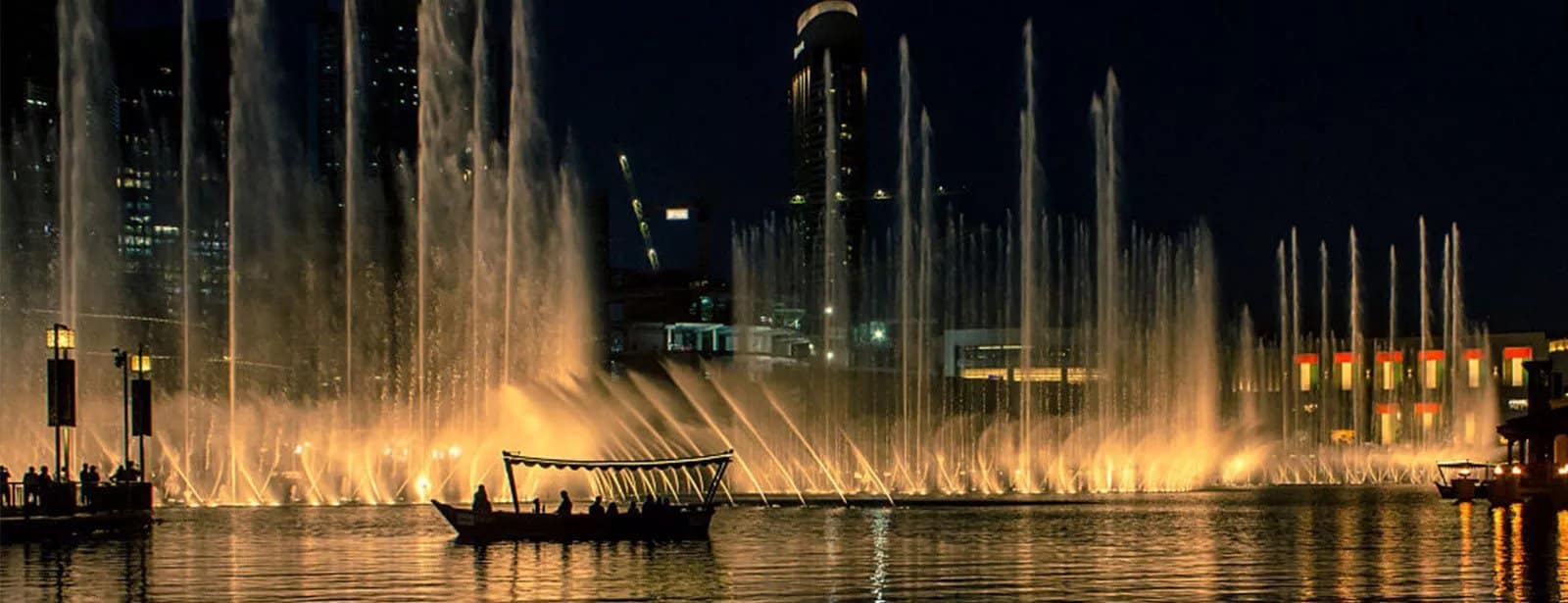 The Dubai Fountain Lake Ride Burj Khalifa at bahrainmegadeals.com